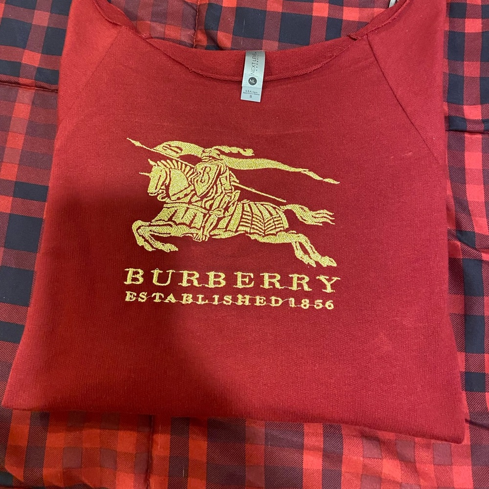 Womens shirt off the shoulder style with decal-logo